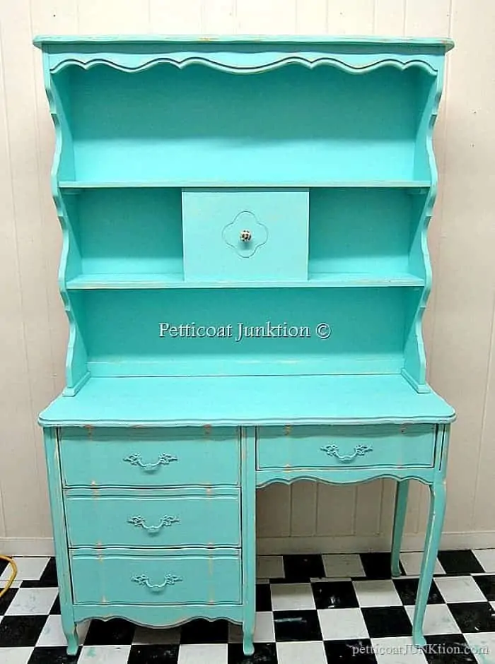 Beautiful French Provincial hutch and dresser painted turquoise is one of 15 diy turquoise furniture makeovers featured today