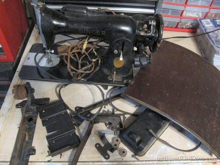 antique sewing machine removed from cabinet