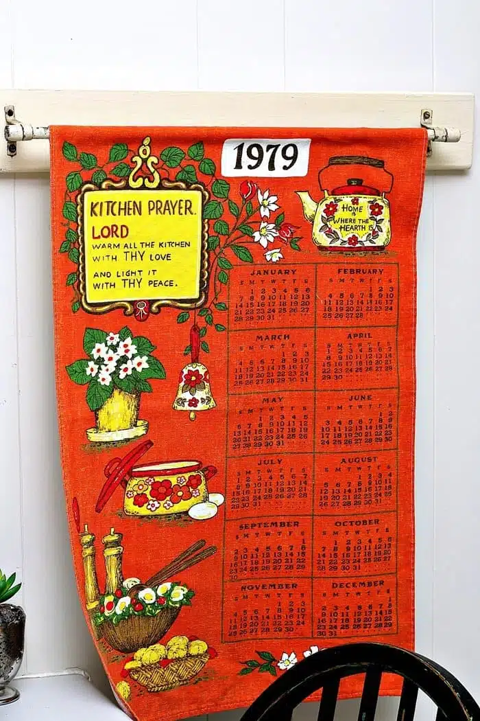 Hang A Vintage Tea Towel Calendar From A Curtain Rod