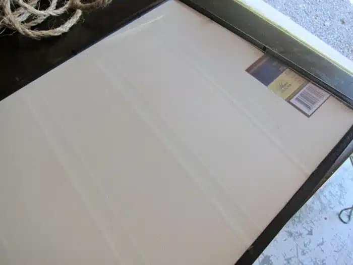 frame placemat with glass behind mat in frame