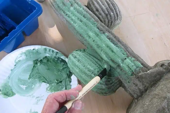 Painting a concrete cactus with watercolors