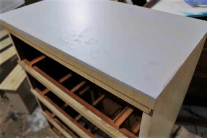 how to prime damaged mdf furniture and cover the bubbled up fake wood