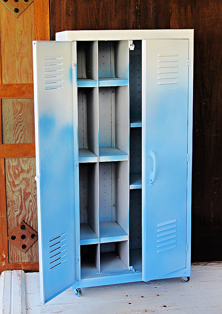 the inside of a painted metal locker