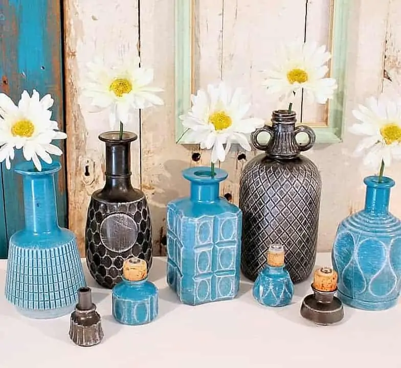 Spray Paint Glass Bottles Then Dry-Brush With White Paint