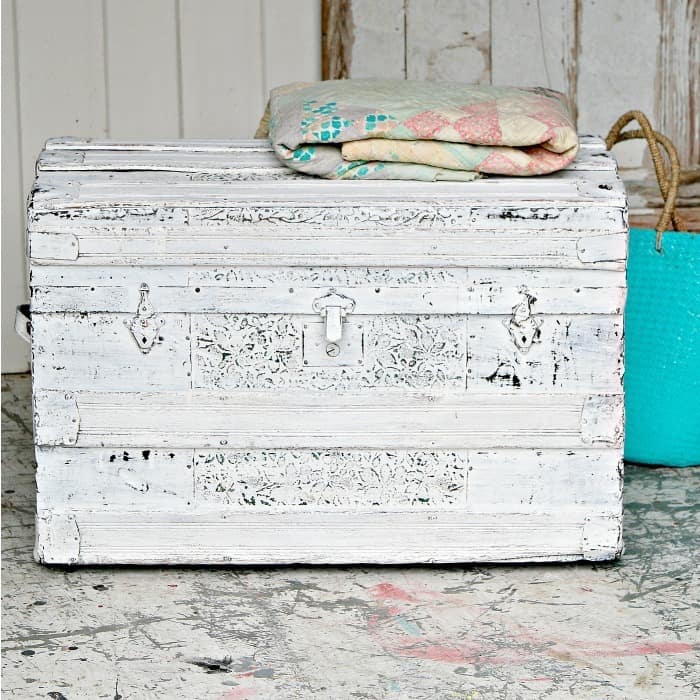 In this post I teach you how to distress white paint to showcase all the beautiful details. It's okay to paint antique furniture and distressing the paint adds character.