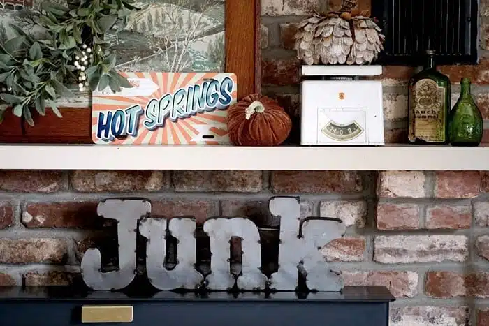 Decorating the fireplace mantel with junk finds