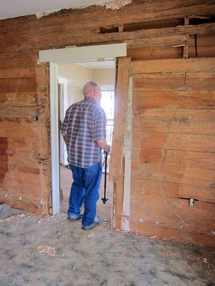 my Dad looking at the remodel job of his parents home