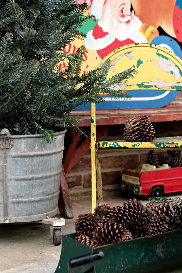 pine cones from Dad's Farm and a chippy yellow childs chair