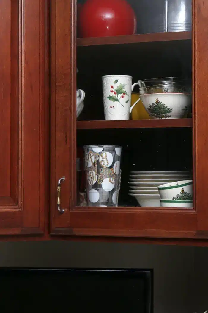 Christmas dishes in the cabinets for display