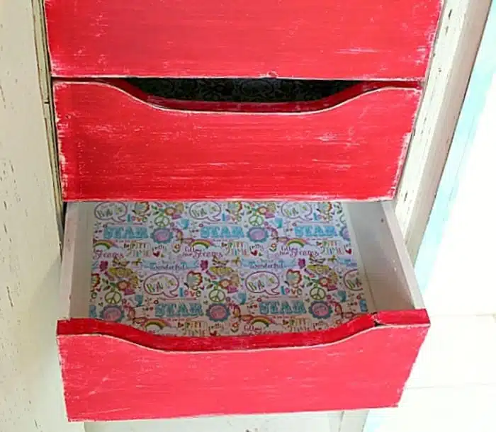 Line furniture drawers with scrapbook paper