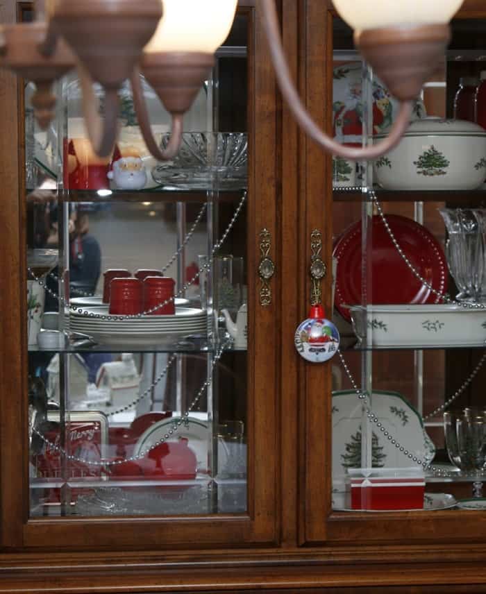 china cabinet with Christmas dishes