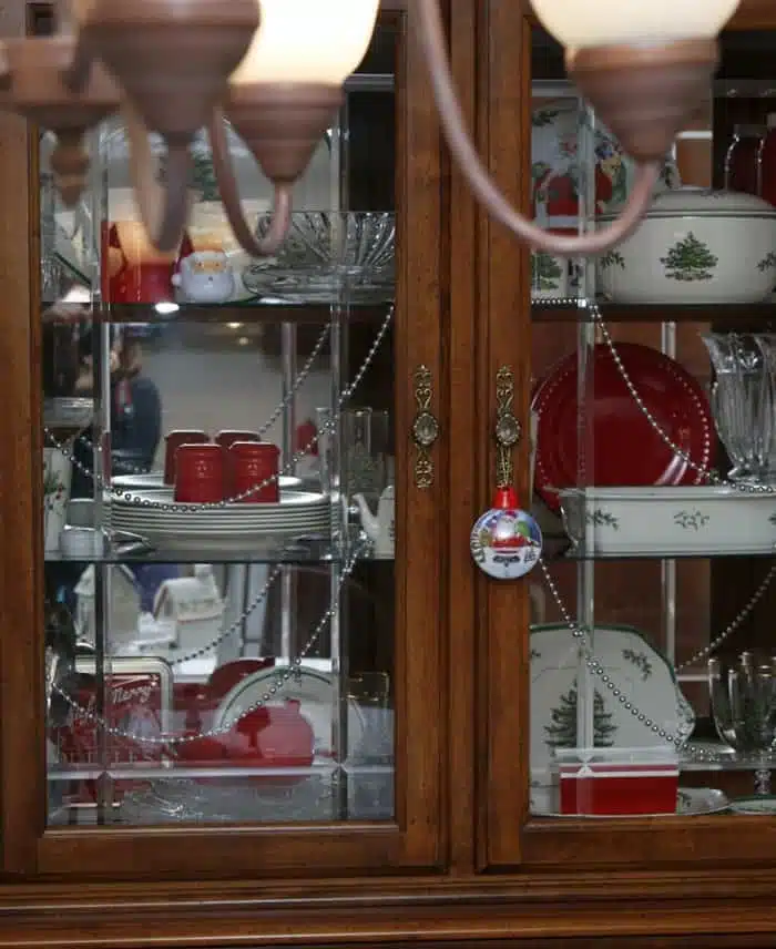 china cabinet with Christmas dishes