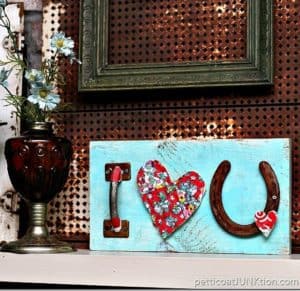 say I love you with reclaimed junk and make a wall sign