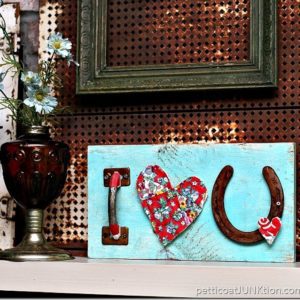 say I love you with reclaimed junk and make a wall sign