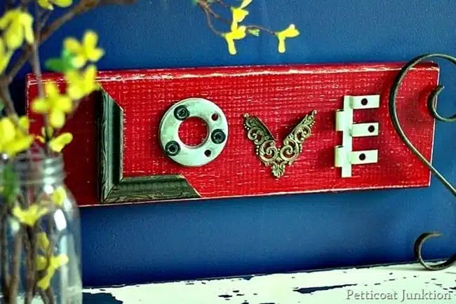 make a love wall sign using reclaimed junk