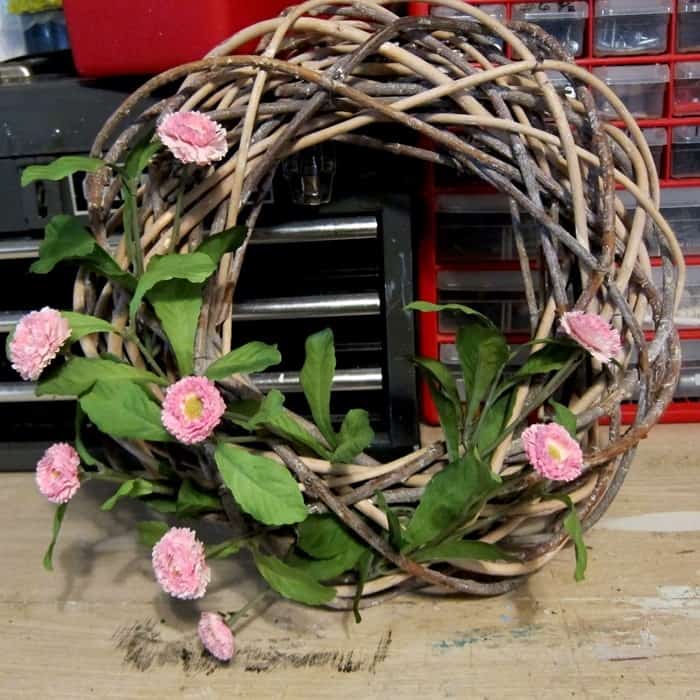 decorate a wreath with flowers