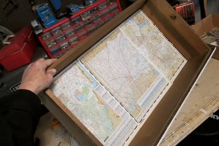 old atlas map pages make great furniture drawer liners