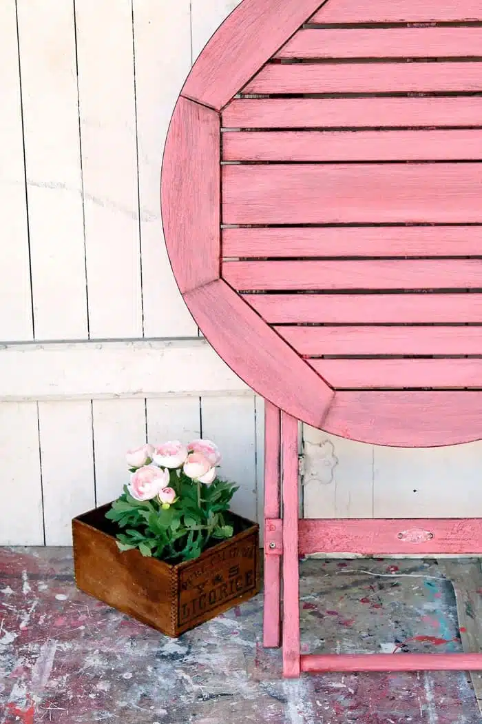 You can paint an outdoor wood table to look naturally aged