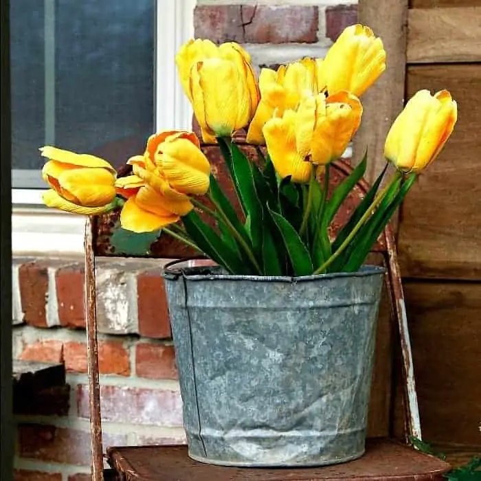 Yellow Front Porch Decor And A Sparkly Bunny Ears Wreath