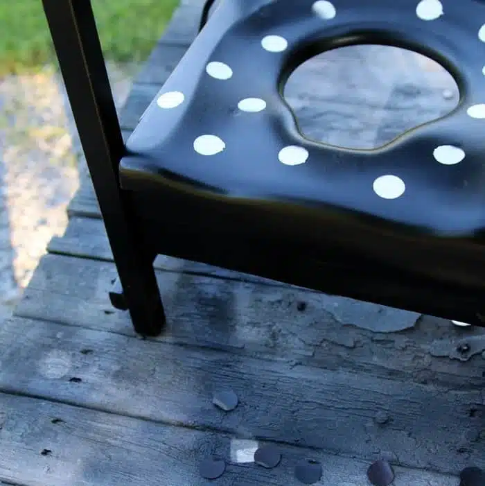 black and white polka dot potty chair turned planter