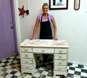 white distressed desk painted by student at a furniture painting workshop