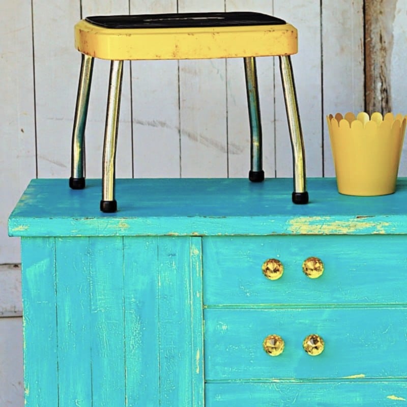 blue and yellow cedar chest painted and distressed with Vaseline