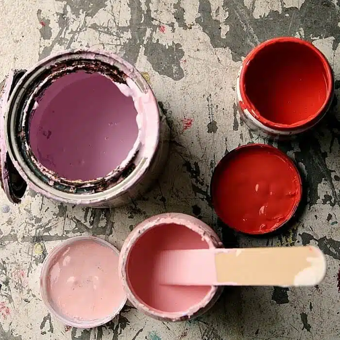 mixing paints together to make custom paint color for furniture makeover