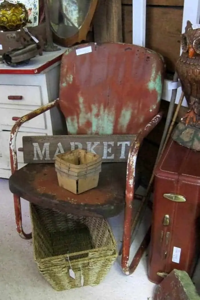 rusty chipped vintage metal lawn chair 