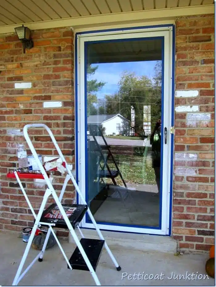 did you know you can paint a metal storm door with primer and latex paint