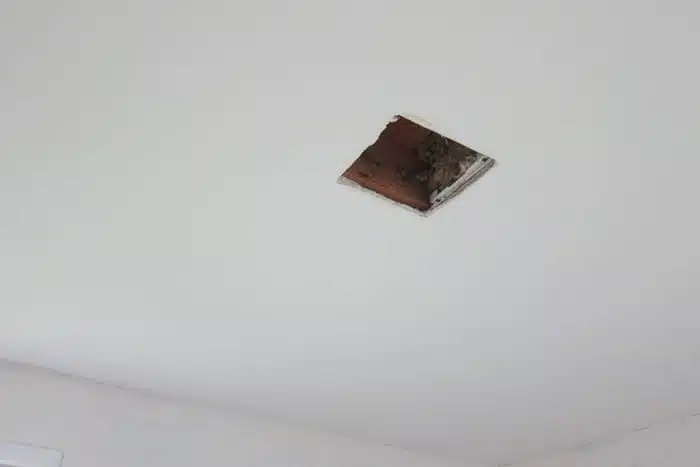 hole in ceiling where square inset light fixture was located