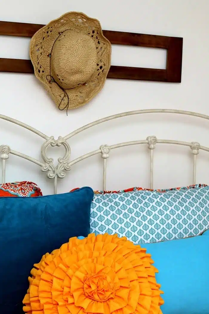 how to paint and decorate a guest bedroom with white paint and pops of color