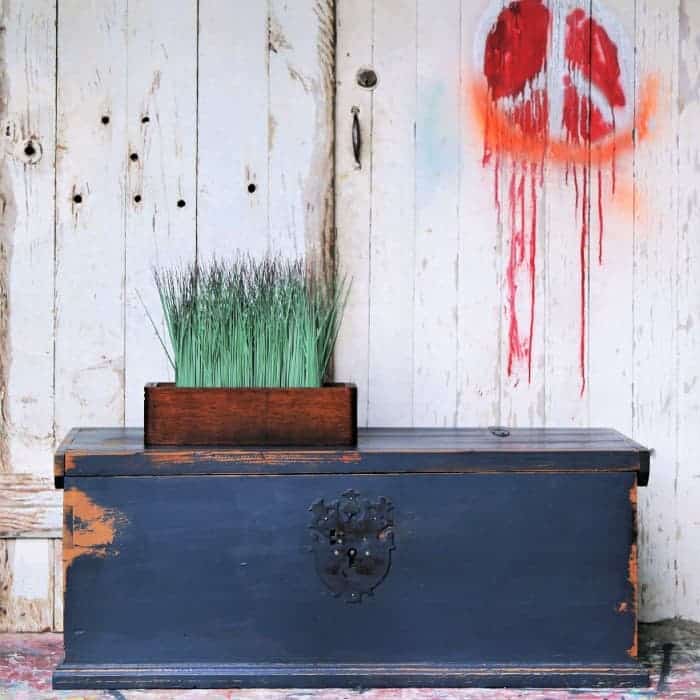 rustic wood trunk painted with Benjamin Moore paint color Hale Navy