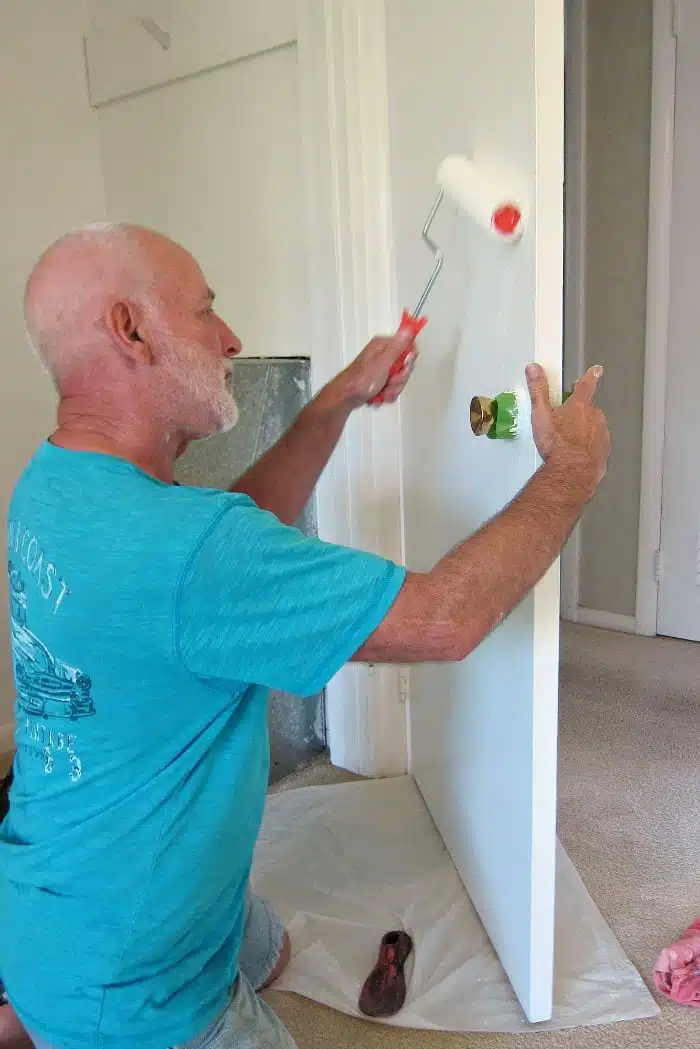 use painters tape around door knobs when painting doors