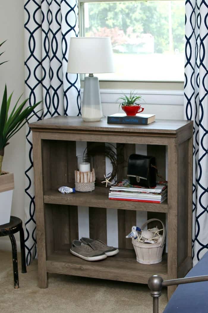 Target bookcase rustic finish custom painted with white stipes using Delta Ceramcoat paint