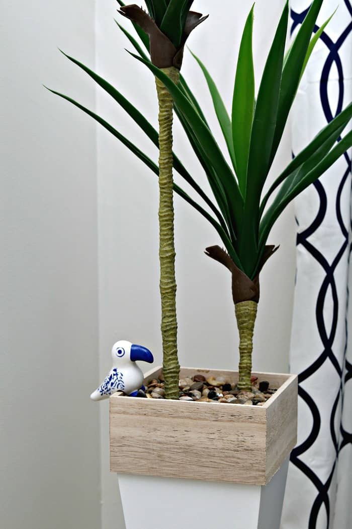 Tucan bird plant sitter