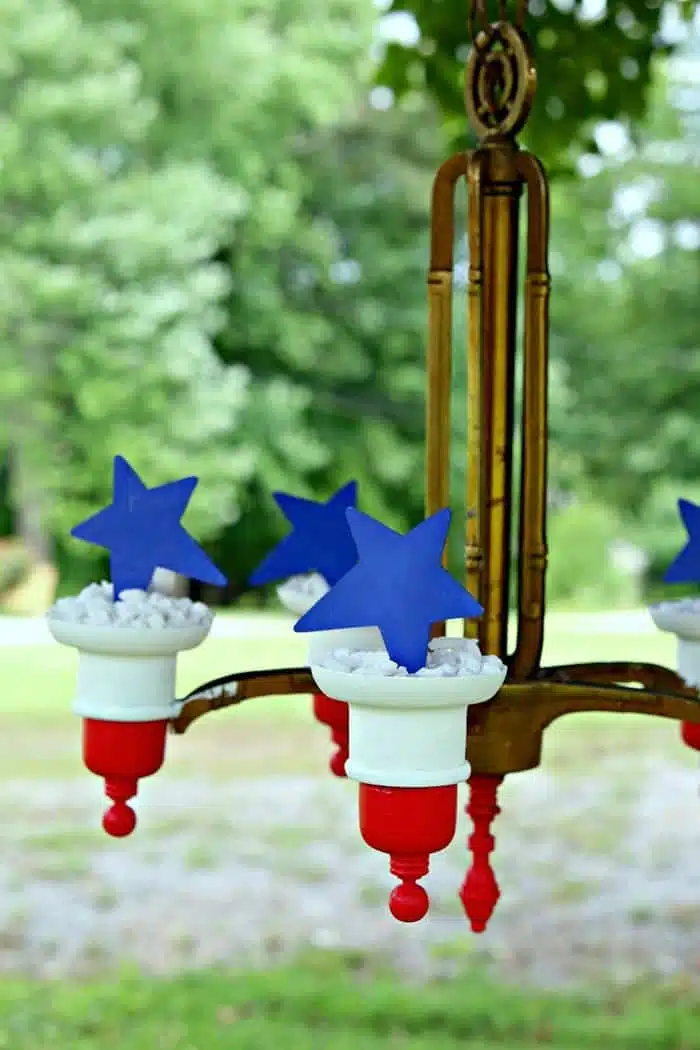 blue stars and red and white striped brass chandelier makeover