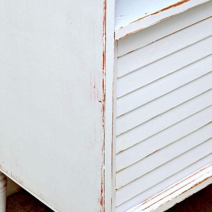 distressed orange and white painted furniture
