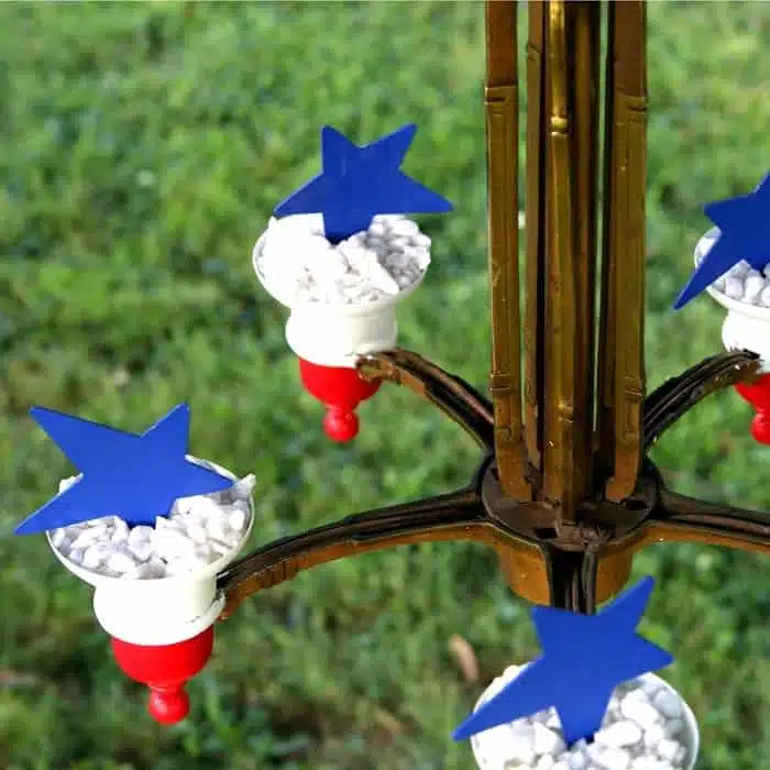 red white and blue project made from an upcycled brass chandelier