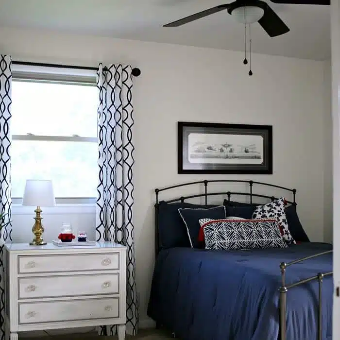 total bedroom transformation with paint, ceiling fans, furniture, bedding and more in navy and whtite with pops of red