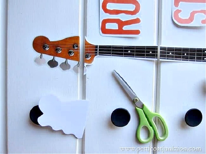 applying a peel and stick decal to furniture