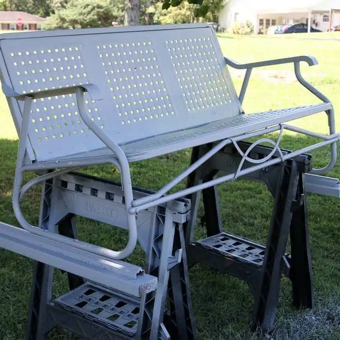 metal furniture painted with primer using a paint sprayer