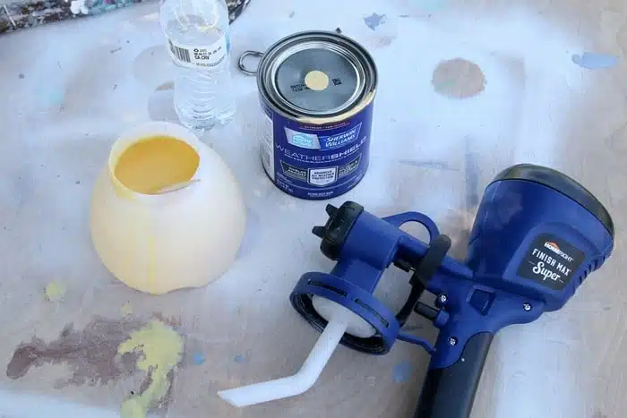 use latex paint in a HomeRight paint sprayer to paint outdoor furniture