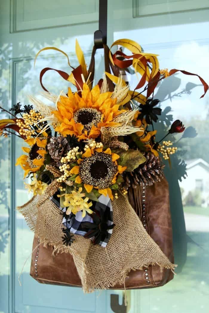 Make a purse wreath for your front door using sunflowers and buffalo check fabric