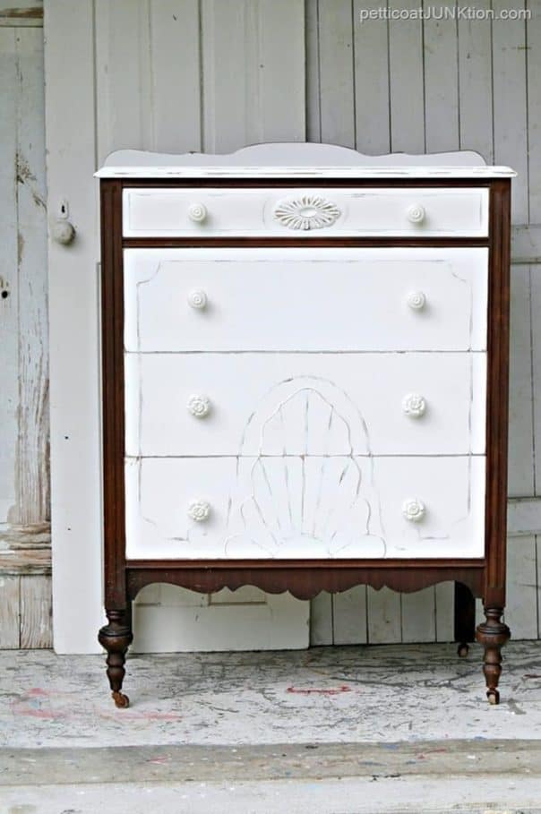 beautiful painted chest of drawers showcases the original stained finish