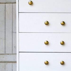The combination of metallic gold spray paint and glossy white paint is a winner.