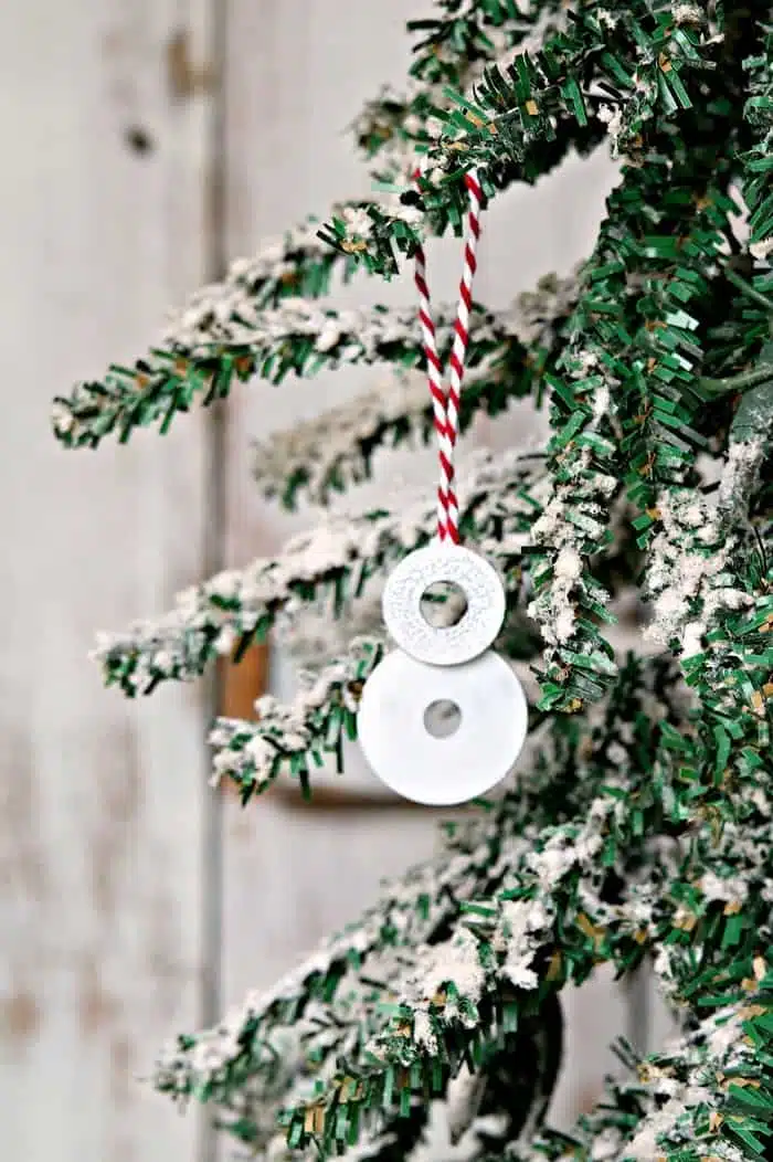 tiny snowman ornament made from stainless steel washers