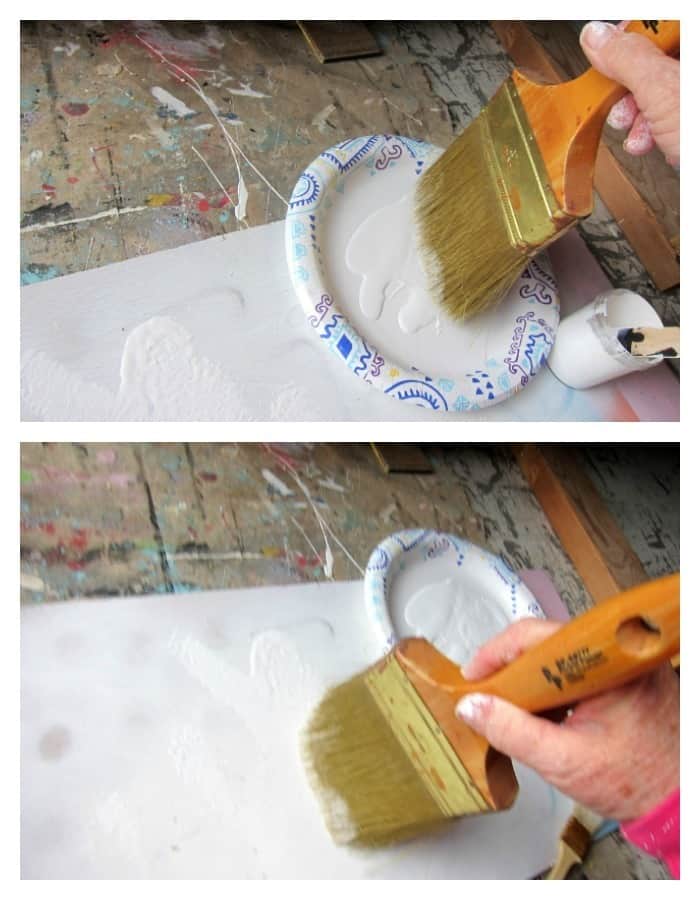 dry brushing white paint over gray