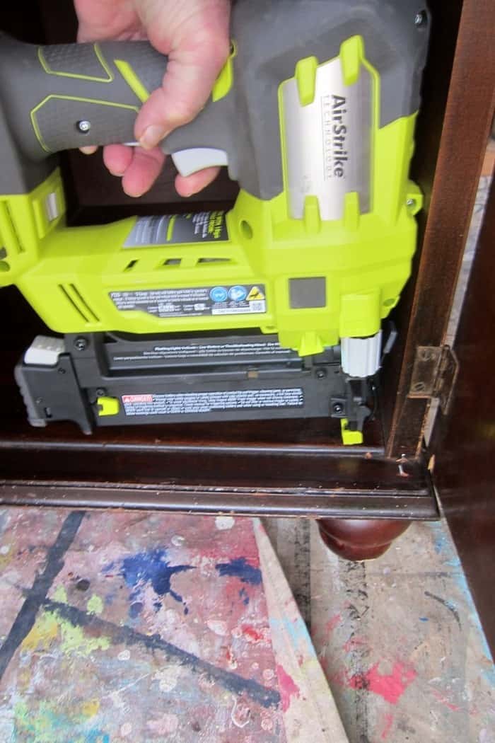 making furniture repairs using a Ryobi brad nailer