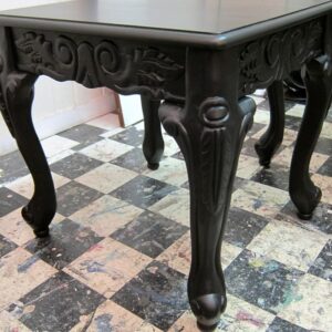 ornate side table painted black