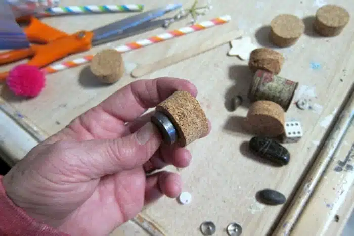 refrigerator magnet made from cork can be used to thumb tack things to the magnet